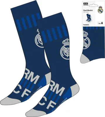 A pair of Real Madrid football socks displayed on a white background, with packaging visible to the right.