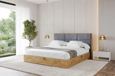 A bedroom scene with a bed as the main focus.