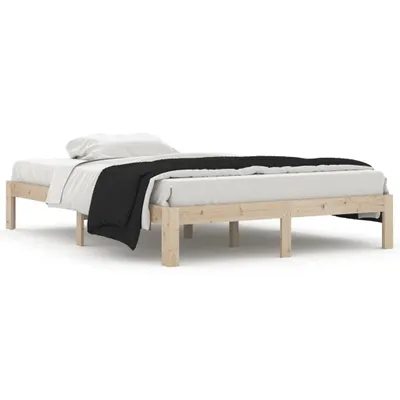 A wooden bed frame with white bedding and a black blanket.