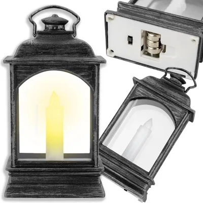 Zdjęcie produktu dla Latarnia laterenka plastikowa LED dekoracyjna lampka świąteczna wisząca srebrna ze świeczką na baterie AG13