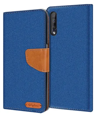 A blue flip case for a smartphone, with a brown leather accent and a small logo.