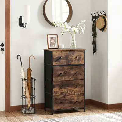 A hallway with a chest of drawers, umbrella stand, and wall decor.