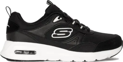 A black Skechers sneaker with a white sole and white accents.
