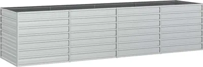 A long, rectangular, silver raised garden bed.
