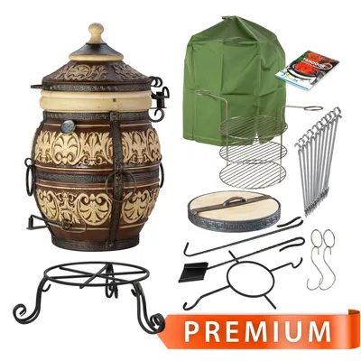 A collection of tandoor oven accessories and a tandoor oven cover are displayed against a white background.