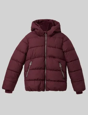 A studio shot of a burgundy puffer jacket.