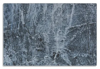 Produktbild von Wallario Frühstücksbrettchen aus Glas 20 x 30 cm mit rutschfesten Füßen, Motiv Alte graue Steinwand