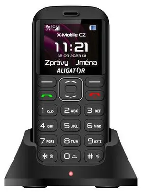 A black ALIGATOR A720 4G feature phone is shown in its charging dock against a black background.