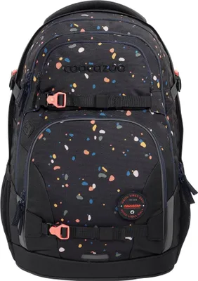 A black backpack with a confetti-like pattern of colorful dots and specks. The backpack has multiple pockets, straps, and buckles, with a circular logo on the front.