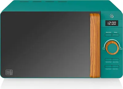 A teal microwave with a wood-grain handle and a digital display.