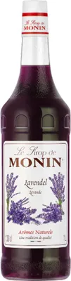 A bottle of Monin Lavender syrup against a white background.