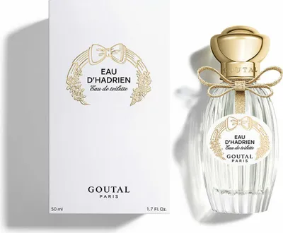 A perfume bottle and its packaging are displayed side-by-side against a white background.
