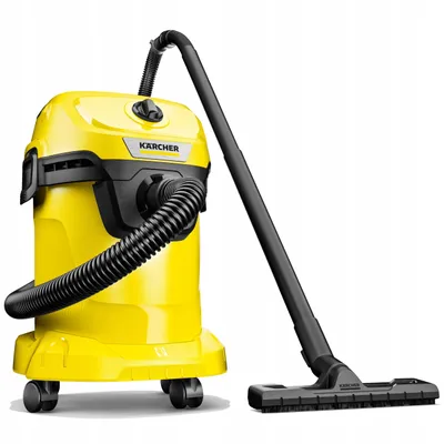 A yellow and black Karcher vacuum cleaner with its hose and floor attachment is shown against a white background.