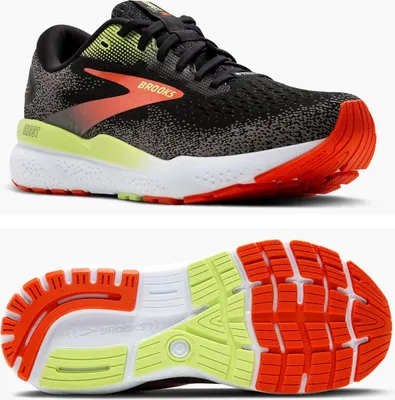 A pair of black Brooks running shoes shown from two angles: side view and bottom view.