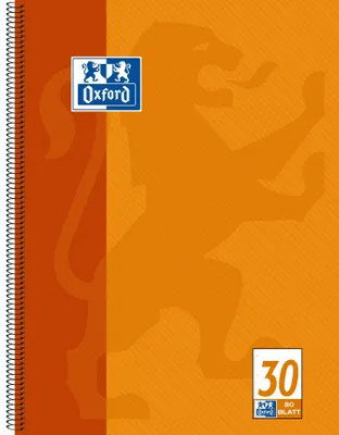A notebook cover with a lion graphic and branding.