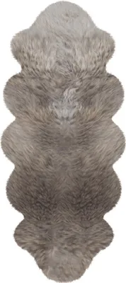A top-down view of a double sheepskin rug.