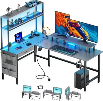 Immagine prodotto di Scrivania angolare da gaming con spazio contenitore - Ideale per gioco e lavoro - Illuminazione integrata - 150 x 100 cm - Grigia
