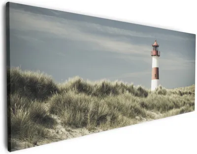 Produktbild von Wallario Premium Leinwandbild Leuchtturm auf der Düne am Strand in Größe 50 x 125 cm