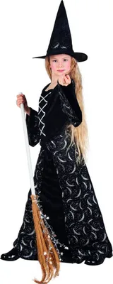 A young girl dressed in a witch costume holding a broom.