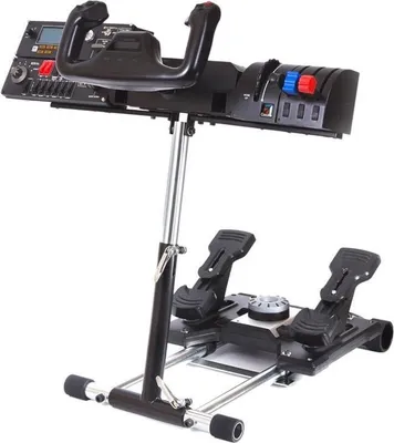 A flight simulator yoke, throttle quadrant, and rudder pedals mounted on a stand.