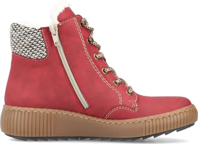 A red boot with laces and a zipper on a white background.
