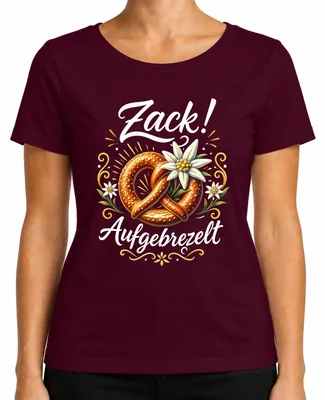 Imagen del producto de Camiseta de mujer, color burdeos, talla S, con motivos de pretzel, edelweiss y elementos de la vestimenta tradicional alpina. Incluye detalles de cuero