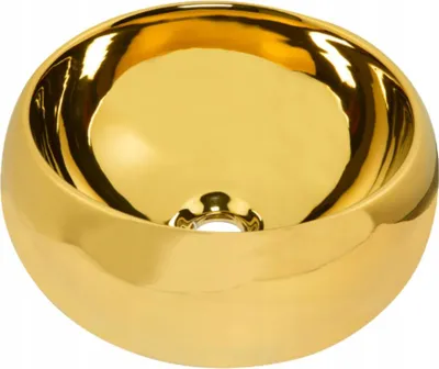 A close-up studio shot of a gold washbasin.