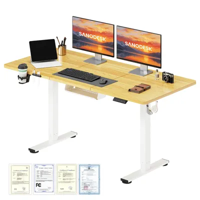 A standing desk setup with dual monitors, a laptop, and accessories.
