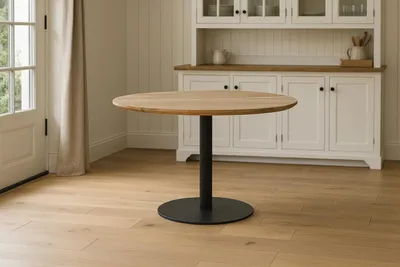 Produktbild von Bistrotisch Schweizer Kante massiv 110 cm Akazie naturfarben Säulengestell-rund schwarz BRASILIAN