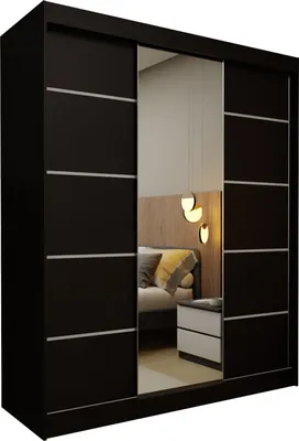 A black wardrobe with mirrored doors, reflecting a bedroom interior with a bed and nightstand.