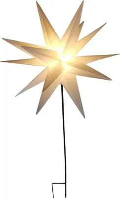 A white star-shaped light decoration on a black stand.