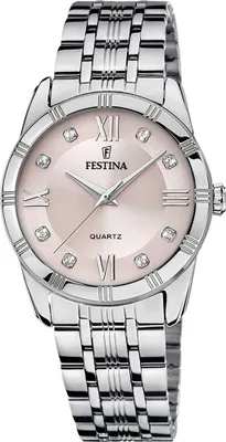 A close-up studio shot of a women's wristwatch.