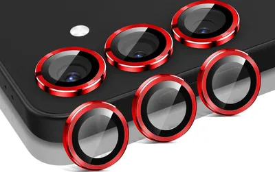 A set of red and silver camera lens protectors for a smartphone, arranged on the back of the phone.