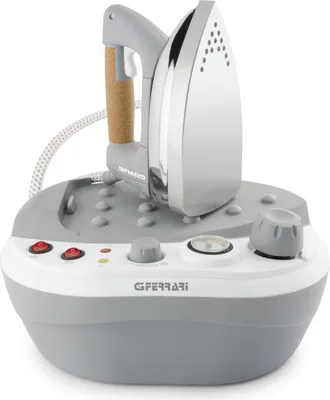 A steam iron and its base are shown against a white background.