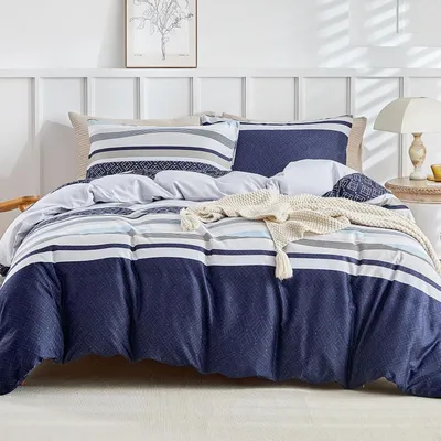 Immagine prodotto di Set di lenzuola in microfibra, composto da 3 pezzi: lenzuolo matrimoniale (240x260 cm) e 2 federe (65x65 cm), colore blu e bianco a righe