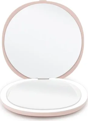 An open compact mirror with LED lights.