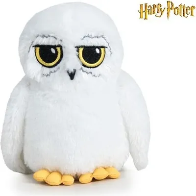 A plush toy owl, likely Hedwig from Harry Potter, is shown against a white background.