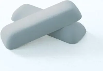 Two gray, rounded rectangular objects are placed diagonally on a white background.