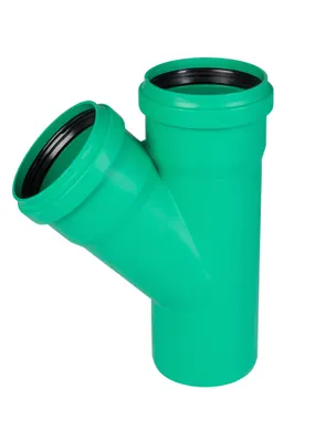 A green pipe fitting with a Y-shape, isolated on a white background.
