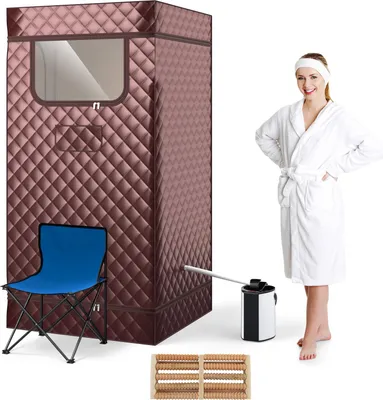 A woman in a bathrobe stands next to a portable sauna tent, with a chair, steam generator, and foot massager displayed.