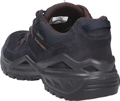 A rear view of a dark brown LOWA hiking shoe.