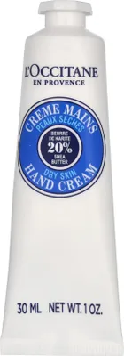 A white tube of L'Occitane Shea Butter Hand Cream.