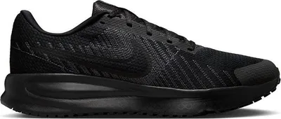 A studio shot of a single black Nike running shoe.