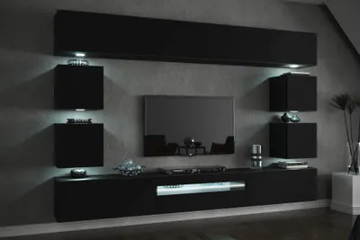 A modern black living room entertainment unit with integrated LED lighting.