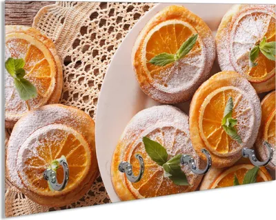 Produktbild von Wallario Schlüsselbrett aus Glas, Motiv: Frische Biskuits mit Orangenscheiben, 30 x 20 cm mit 4 Haken