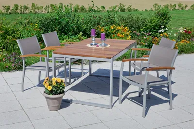 An outdoor patio setting with a dining set.