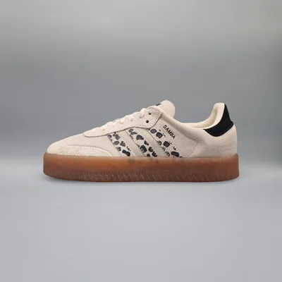 A side view of an Adidas Sambae sneaker with a leopard print pattern.