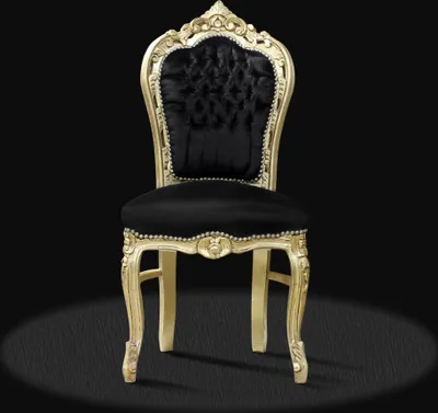 A single baroque-style chair with black upholstery and a gold-colored frame is presented against a black background.