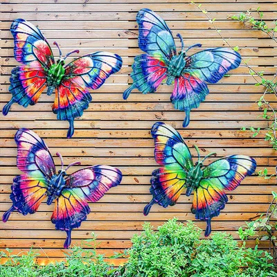 Imagen del producto de Decoración de pared con forma de mariposa de metal, juego de 4 piezas, 23 cm, de colores variados, ideal para jardín y balcón