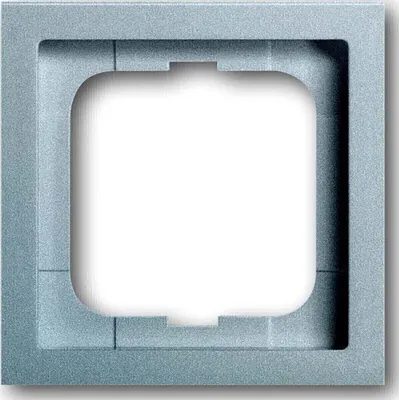 A close-up of a gray square frame with a rounded inner opening.